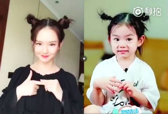 复制粘贴!戚薇与女儿lucky扎同款哪吒头狂比心