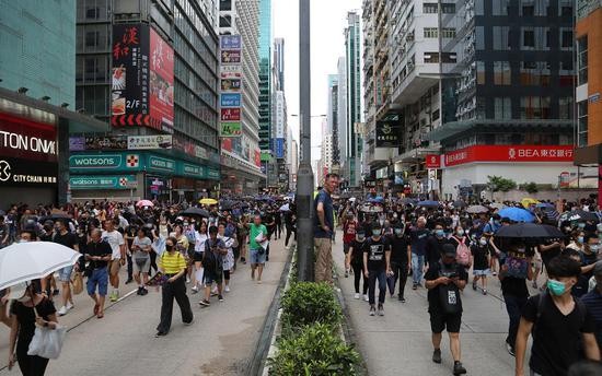 黑衣人非法集会堵塞旺角商圈主要街道。摄影：环球时报记者陈青青