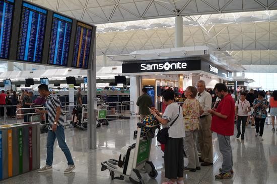 香港国际机场14日气氛仍显紧张。（图：大公文汇全媒体）