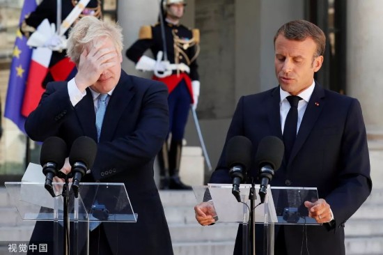  ▲当地时间2019年8月22日，英国首相约翰逊与法国总统马克龙发表联合声明。
