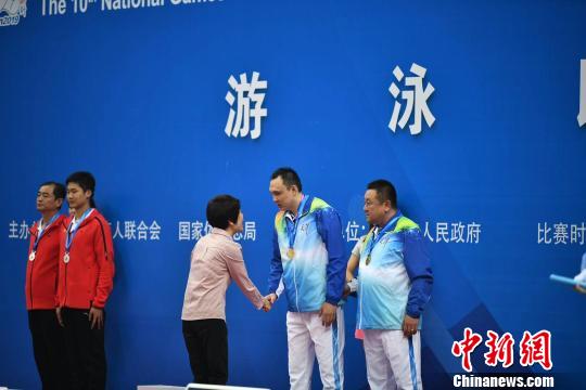 三届残奥会冠军杨博尊获天津残运会开幕后首金