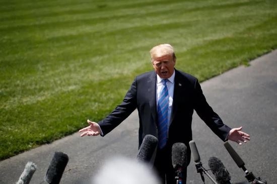 ▲资料图片：2019年5月14日，在美国华盛顿白宫南草坪，美国总统特朗普回答记者提问。新华社发