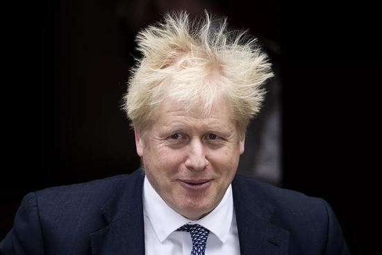 10月23日,约翰逊出发前往议会。/视觉中国