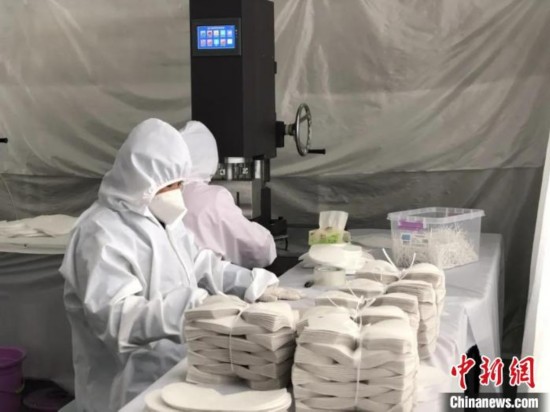 探中国最大的冲锋衣生产基地:“组团”转产防疫物资