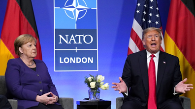 特朗普和默克尔在北约峰会期间举行双边会晤。图源:路透社