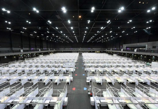 方舱|“港版方舱医院”启用,首批约20名患者入住,内景曝光