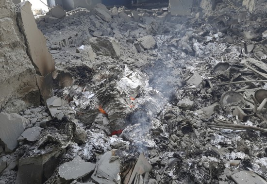 资料图：阿富汗一栋房屋在空袭中被毁