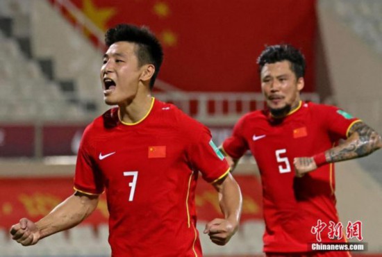 资料图：武磊庆祝进球。 图片来源：视觉中国