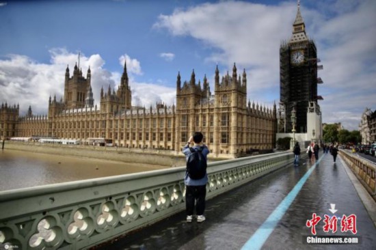 图为当地时间2021年9月10日，英国伦敦，著名地标大本钟的修复工作接近完成。 图片来源：ICphoto