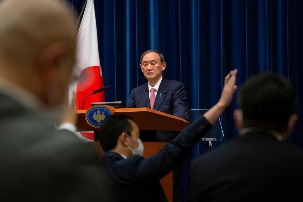 △5月14日，日本首相菅义伟出席新闻发布会。