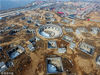 2018年1月21日，河南三门峡，陕州区几座地坑院呈“八卦”形状分布在黄土地上，鸟瞰视角十分新颖。


