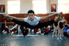 2016年02月17日，山东省济南市，山东艺术学院的舞蹈表演专业考试之前，考生们相互帮助进行各种高难度技巧动作热身。