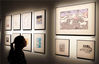 A visitor looks at prints at an exhibition in Suzhou, Jiangsu province, Oct 8, 2018. [Photo by Wang Jiankang/Asianewsphoto]
An exhibition at the art gallery of the Eslite Bookstore in Suzhou, set to last until Oct 26, features illustration prints of Shanghai writer Jin Yucheng and silkscreen prints of Shanghai artist Lu Zhiping. The 79 art pieces on display tell a story of the communication between literature and prints.