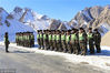 2018年11月11日，新疆喀什，受持续强冷空气影响，新藏线库地达坂段出现5公里结冰路面，武警某部交通第三支队养护一大队紧急救援。
下达救援任务。