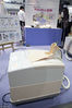 当地时间2013年11月6日，日本东京，为期4天的2013年国际机器人展6日在东京国际会展中心正式开幕。名为“微笑代码”的可在床上使用的自动马桶参加展览。