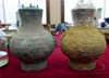 2018年11月5日，河南省洛阳市西工区发现一西汉大墓，考古发掘出的一对青铜壶。