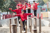 2018年10月31日，河南省登封市，两位功夫小子变身快递员，功夫+快递吸引不少人的关注。 拿到包裹的武校学生们，梅花桩上即兴摆个pose。