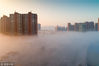 2018年11月8日，山西省运城市区内出现罕见的平流雾景观，整座城市在大雾中若隐若现，宛若人间仙境。