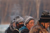 2018年12月11日，黑龙江省哈尔滨市，松花江上，采冰人在漫天霞光中破冰、采冰，金色光芒在水雾上升腾缭绕，给劳动的场面增添了诗意。
