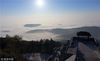 2018年12月3日上午，江苏镇江，在句容茅山风景区的二茅峰，清晨时分的山林雾气缭绕，朦胧婉约，若隐若现。步入其中，真如置身仙气十足的幻境一般，当即就有了一种“迷雾仙踪”的奇妙感觉。万凌云/视觉中国