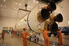 2010年9月12日中午，西昌，承载“嫦娥二号”卫星的长征三号丙火箭在测试厂房吊装，准备运往发射工位。