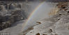 2018年12月8日，山西临汾，吉县黄河壶口瀑布飞溅的浪花和水雾在两岸的岩石和护栏上凝结，形成冰挂景观，与瀑布上空飞架的彩虹交相辉映，美不胜收。
