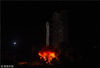 北京时间12月8日凌晨2时23分，中国在西昌卫星发射中心用长征三号乙运载火箭成功发射嫦娥四号探测器，开启了中国月球探测的新旅程——嫦娥四号后续将经历地月转移、近月制动、环月飞行，最终实现人类首次月球背面软着陆，开展月球背面就位探测及巡视探测，并通过已在使命轨道运行的“鹊桥”中继星，实现月球背面与地球之间的中继通信。这次嫦娥四号发射，也是中国长征系列运载火箭第294次航天飞行。图为火箭点火瞬间。 