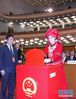 3月17日，十三届全国人大一次会议在北京人民大会堂举行第五次全体会议。这是监票人在投票。 新华社记者刘卫兵摄
