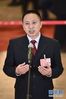 3月5日，第十三届全国人民代表大会第一次会议在北京人民大会堂开幕。这是全国人大代表王建清在“代表通道”接受采访。 新华社记者 刘金海摄