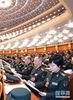 3月5日，第十三届全国人民代表大会第一次会议在北京人民大会堂开幕。这是代表们在认真听会。 新华社记者 李刚 摄