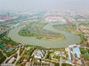 2018年4月15日，江苏扬州，航拍美丽的运河三湾，生态公园里春意盎然。