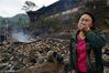 2018年4月21日，贵州黔东南，一村民在凯里市三棵树镇南高村鱼寨组火灾现场哭泣。