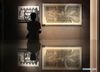 A citizen visits a museum in Pingquan city, North China's Hebei province, May 17, 2018. May 18 marks the International Museum Day. [Photo/Xinhua]