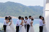 2018年05月20日，海南省陵水县分界洲岛，一场海岛集体婚礼在这里举行，20对国内外新人参加。