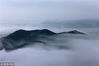 2018年5月21日，安徽黄山，雨后金龙山出现云海景观。施广德/视觉中国
