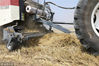 2018年6月14日，石家庄，搂草机将田间小麦秸秆集中在一起。