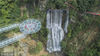 2018年6月28日上午， 广东清远古龙峡，悬空跨度72米，直径16.8米的悬空玻璃平台，揭开了广东生态观光旅游由水路迈向空中发展的新纪元。
图为广东清远清新区古龙峡森林中的巨大悬空玻璃天台。
李星凯/视觉中国

