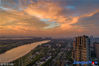 The crimson clouds at sunset flushed the riverside area of Hexi New Town in Nanjing City on July 16.(Source: jschina.com.cn Editor:ourjiangsu.com/Liu Yuan)