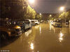 2018年7月5日晚上，南京市雨花台区铁心桥街道一小区大门口，道路被积水淹没，最深处约50厘米，数十辆汽车泡在水里过夜。