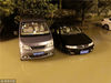 2018年7月5日晚上，南京市雨花台区铁心桥街道一小区大门口，道路被积水淹没，最深处约50厘米，数十辆汽车泡在水里过夜。