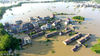 2018年7月8日，江西抚州，无人机拍摄的江西省抚州市东乡区马圩镇桥西村，不少房屋被洪水围困，乡村道路被淹、电力中断、农田被毁。