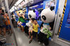 Staff members of Nanjing Hongshan Forest Zoo, dressed as three giant pandas, a Tibetan antelope and an elephant, drew a lot of attention at the Zhujiang Road Station on Line 1 of the Nanjing Metro on Aug. 8. (Photo/VCG)
The animals-like team bought the tickets at ATM machines, accepted the security check, and queued up to board the subway train, just like other passengers.
The activity aimed to encourage residents to visit the zoo, where two giant pandas– He He and Jiu Jiu- will celebrate their birthday on August 10.
