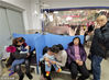 2019年1月13日，武汉。在湖北省妇幼保健院内，挂号处、取药处、输液区，到处都是患儿和家长，连走廊内都坐满家长和患儿。