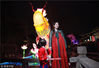 2019年1月19日，江苏省南京市，第33届中国·秦淮灯会亮灯调试，人们在秦淮区的老门东景区赏灯游玩。