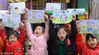 2019年1月24日，郑州，金海螺幼儿园的小朋友在老师指导下，创作生肖猪画，迎接农历猪年春节的到来。