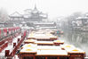 2019年01月09日，江苏省南京市，夫子庙，大雪纷飞。夫子庙古建筑和游船被大雪覆盖，银装素裹，非常漂亮。姚家/视觉中国