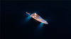 2019年10月14日讯（具体拍摄时间不详），摩纳哥，摩纳哥大力神港举办的游艇展上，数十艘豪华游艇在夜幕降临后开启炫彩灯光，在海面上演了炫彩光影秀。
