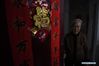 Photo taken on Nov. 7, 2019 shows the survivor of the Nanjing Massacre Jing Zhizhen standing in front of her home. This year marks the 82nd anniversary of the Nanjing Massacre, in which more than 300,000 Chinese were killed by the Japanese invaders who occupied Nanjing on Dec. 13, 1937, marking the start of six weeks of destruction, pillage, rape and slaughter in the city. By Dec. 12, 2019, the number of registered survivors of the massacre has decreased to 78. Reporters from Xinhua spent many years to look for the survivors of Nanjing Massacre and record their current lives. (Xinhua/Ji Chunpeng)