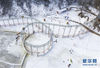 这是12月25日无人机拍摄的山西吉县人祖山首届冰雪节活动现场。 当日，山西吉县人祖山首届冰雪节以冰雕、雪雕以及多种冰雪游乐项目吸引了众多游客前来参观体验。本次冰雪节活动将持续至2020年2月10日。 新华社记者 杨晨光 摄