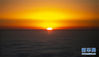 　这是12月29日在四川省峨眉山金顶拍摄的日出。 时值冬日，峨眉山银装素裹、宛如仙境。 新华社记者 李梦馨 摄